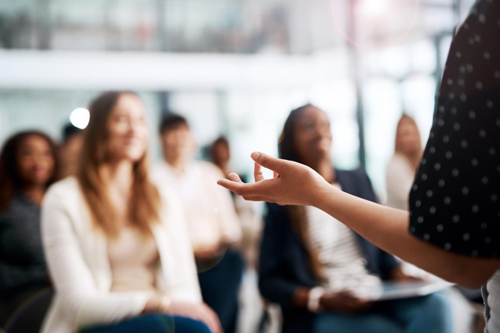 Adult students participating in an English language learning class.